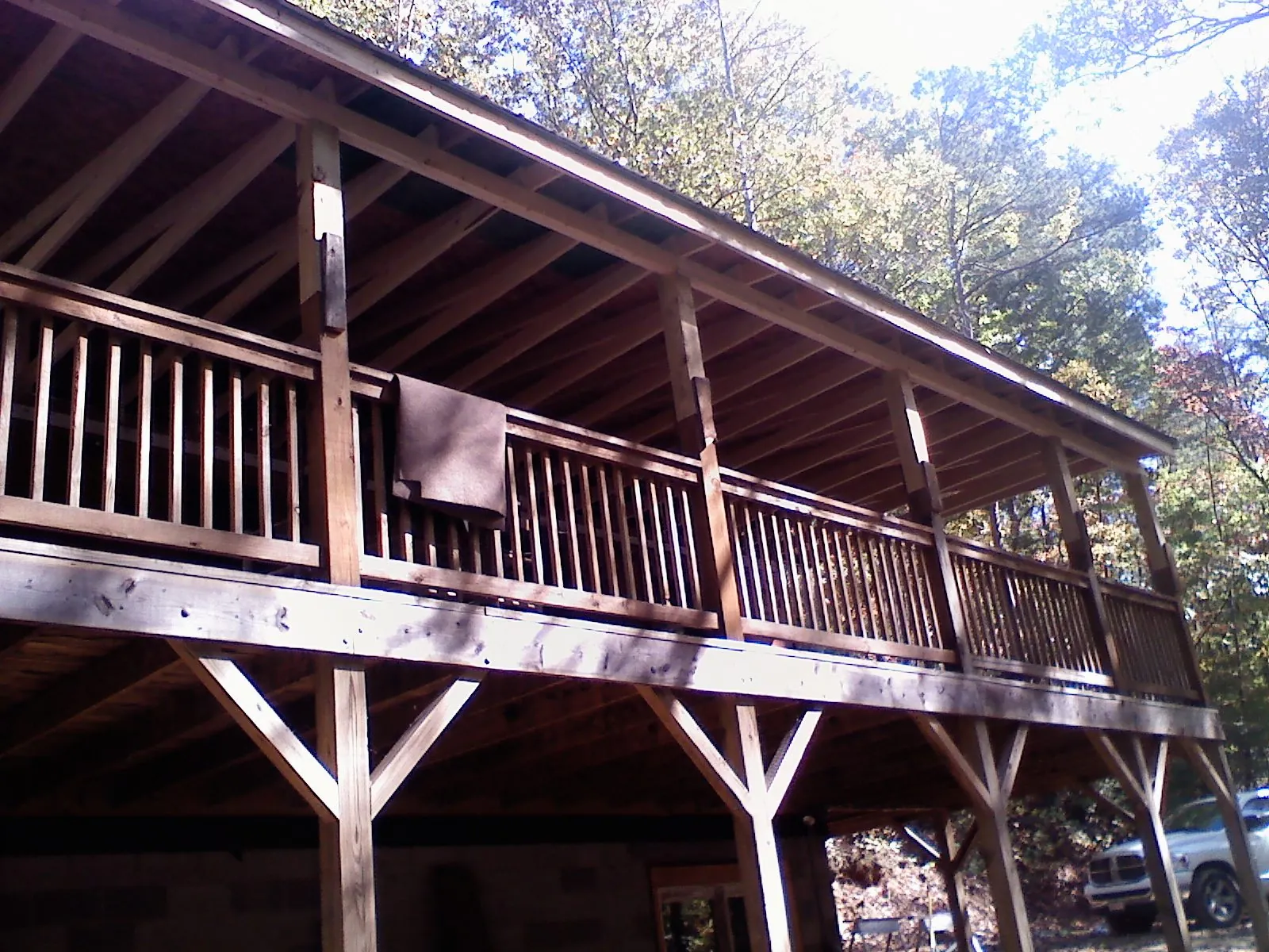 Timber framing under a new elevated porch and deck — Roof Leak Repair in Platteville by Roofing Brothers